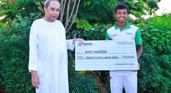 CM Naveen Patnaik felicitates Bapi Hansda with cash reward