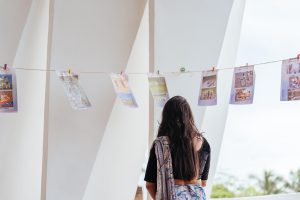 visitors going through the curated gallery